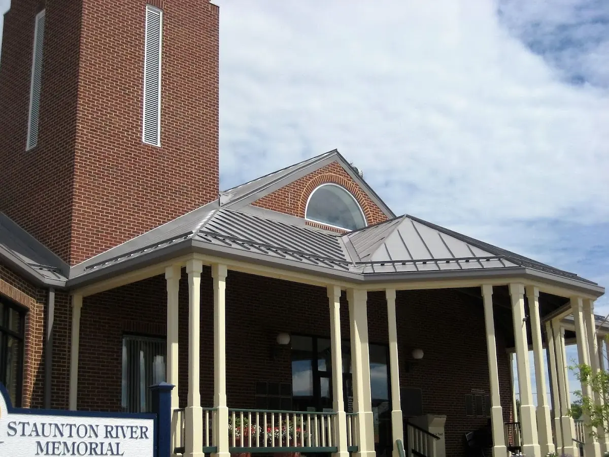 Skilled roofing craftsmen working on a residential roof in Moyock